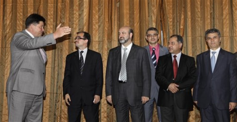 Mikhail Margelov, Radwan Ziadeh, Mulham Al-Droubi